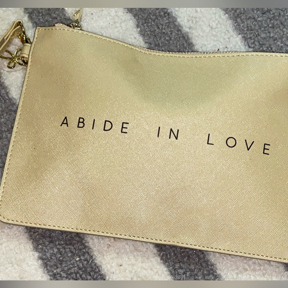 Elegant Gold Clutch with Inspirational Text